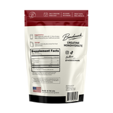 Back of Benchmark Cola Creatine Gummies pouch showing Supplement Facts panel and storage instructions